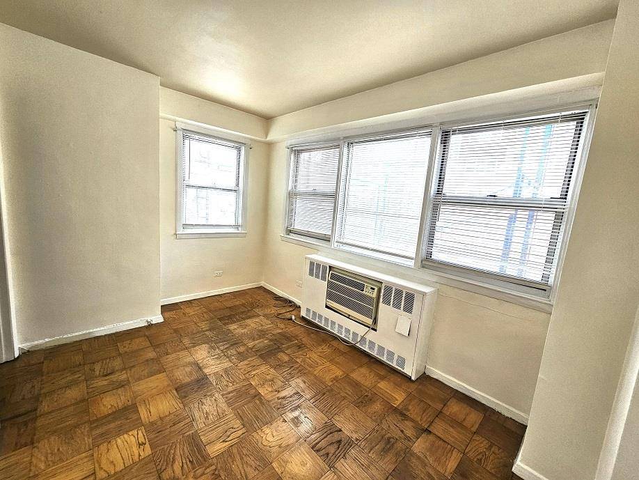 This converted 2 BR, 1 BATH unit with SEPARATE KITCHEN.