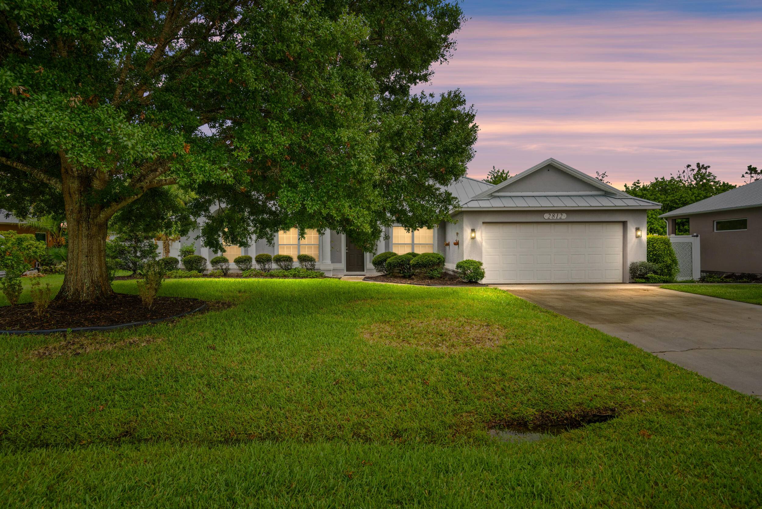 Welcome to 2812 Serenity Circle S, a beautifully maintained 3 bedroom, 2 bath home with a versatile den, perfect for an office or guest room.