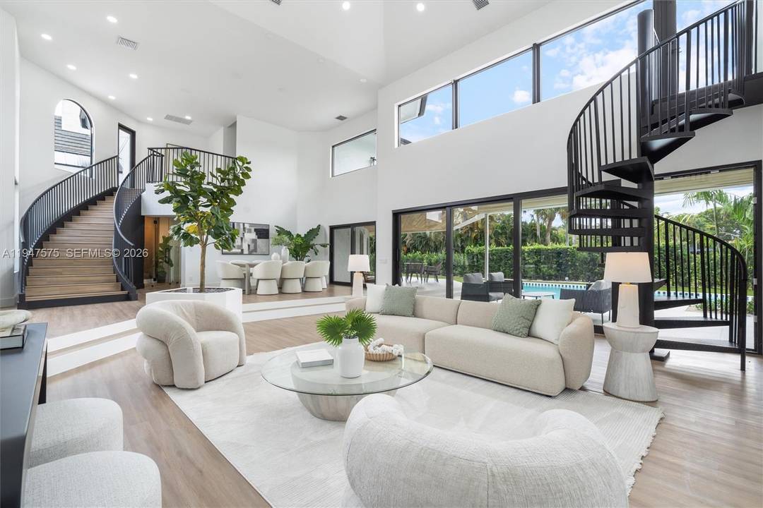 Located in Boca Grove, this charming remodel features a beautiful 16th hole golf course and lake view.