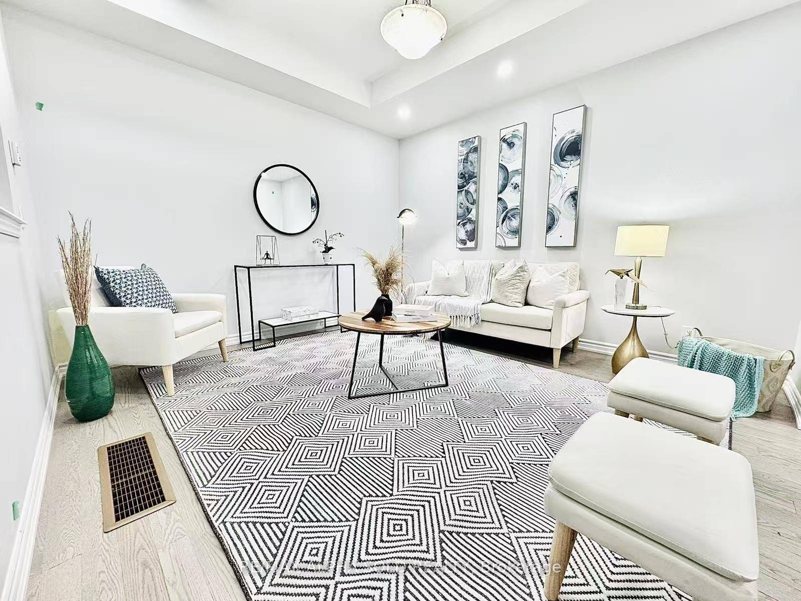 Welcome to 40 Herman Gilroy Lane, a stunning south facing, one year new luxury townhome in the highly sought after Union Village Phase 3 by Minto.