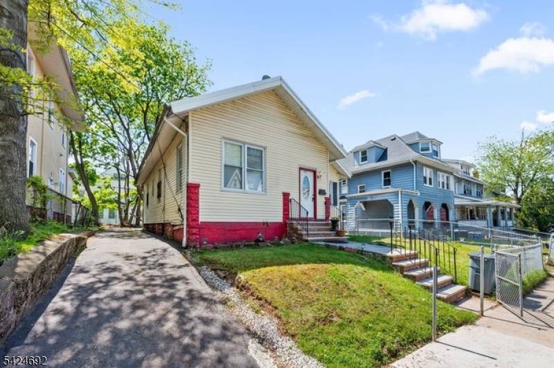 a stunning Newark gem where modern updates meet classic comfort.