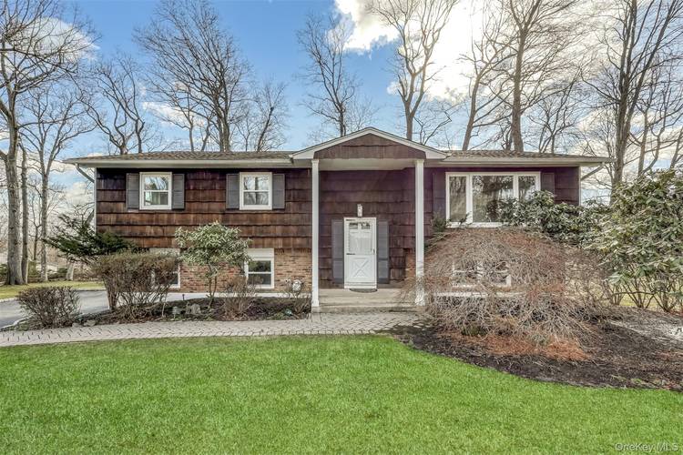 Packed your bags and move right into this immaculate totally renovated high ranch, featuring dreamy modern kitchen with 2 sinks and granite countertops, new windows, stunning lighting, and gorgeous spa ...