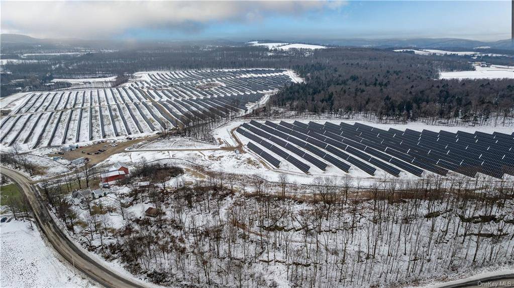 One of the LARGEST working Solar Farms in All of New York state secured by a 25 Year Lease with guaranteed lease payments totaling in excess of 20 Million Dollars ...