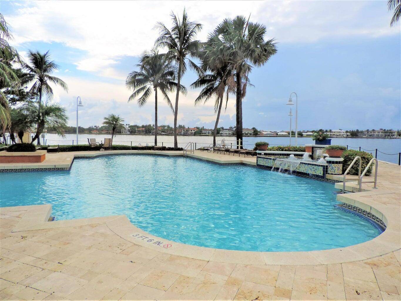Beautiful 2 2 condo with large balcony overlooking green area with intracoastal water views.