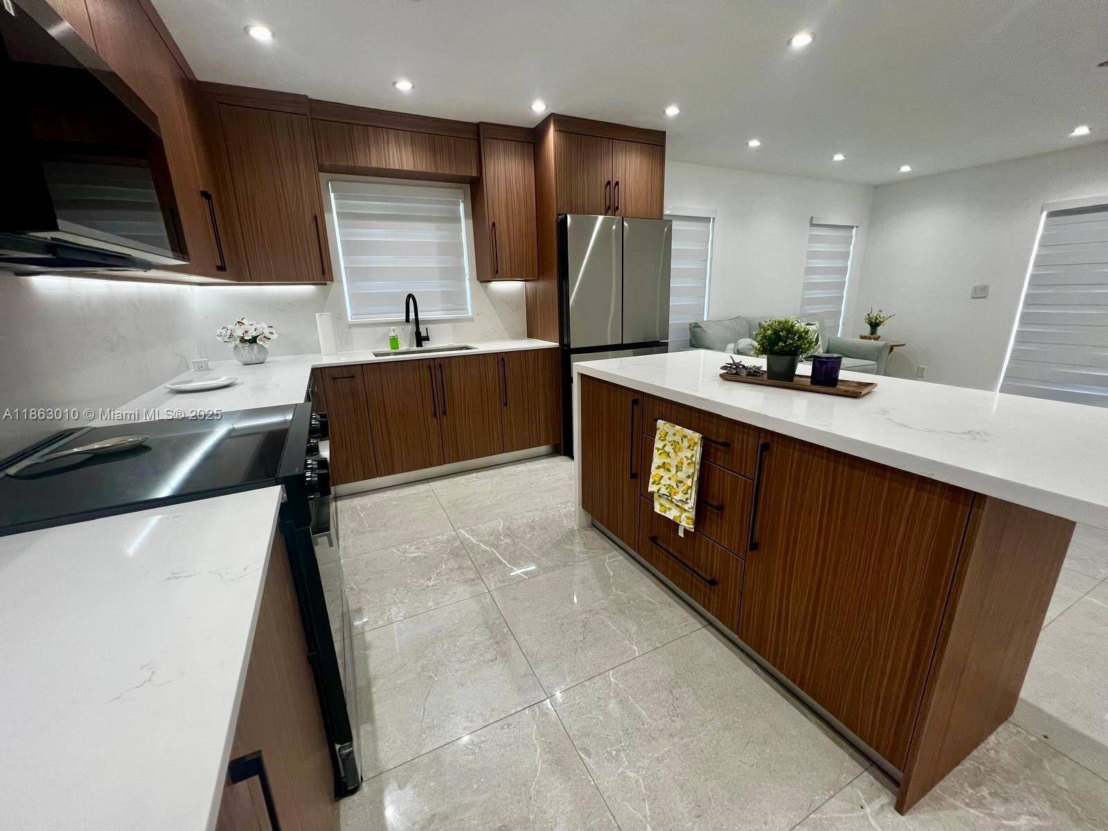 Stunning 4BR 2BA home with versatile office 5th bedroom, perfectly situated on a full builder s acre in highly desirable Davie, FL celebrated as Horse Country for its rich equestrian ...