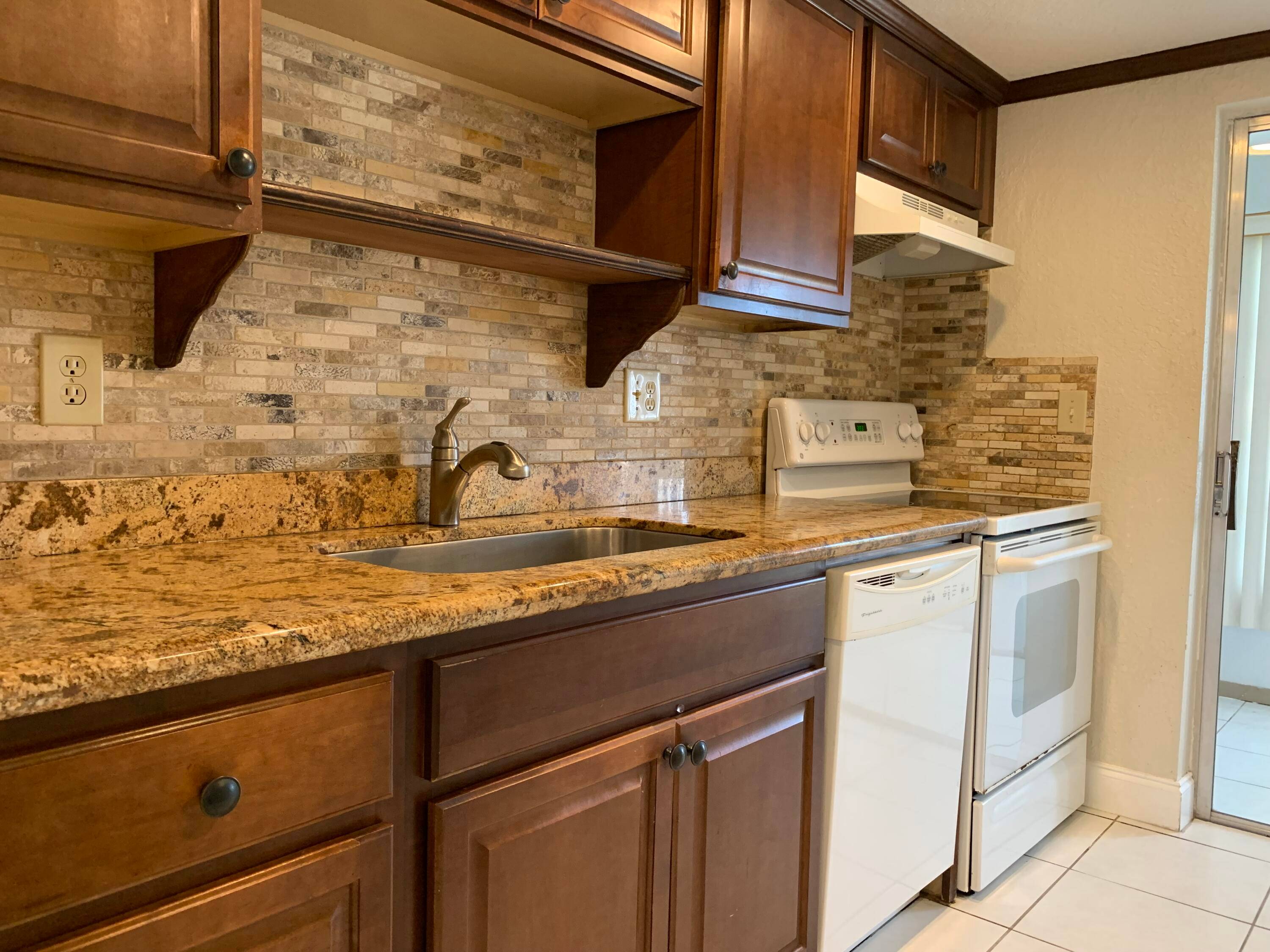 Spacious first floor condo featuring 1 bedroom, 1.