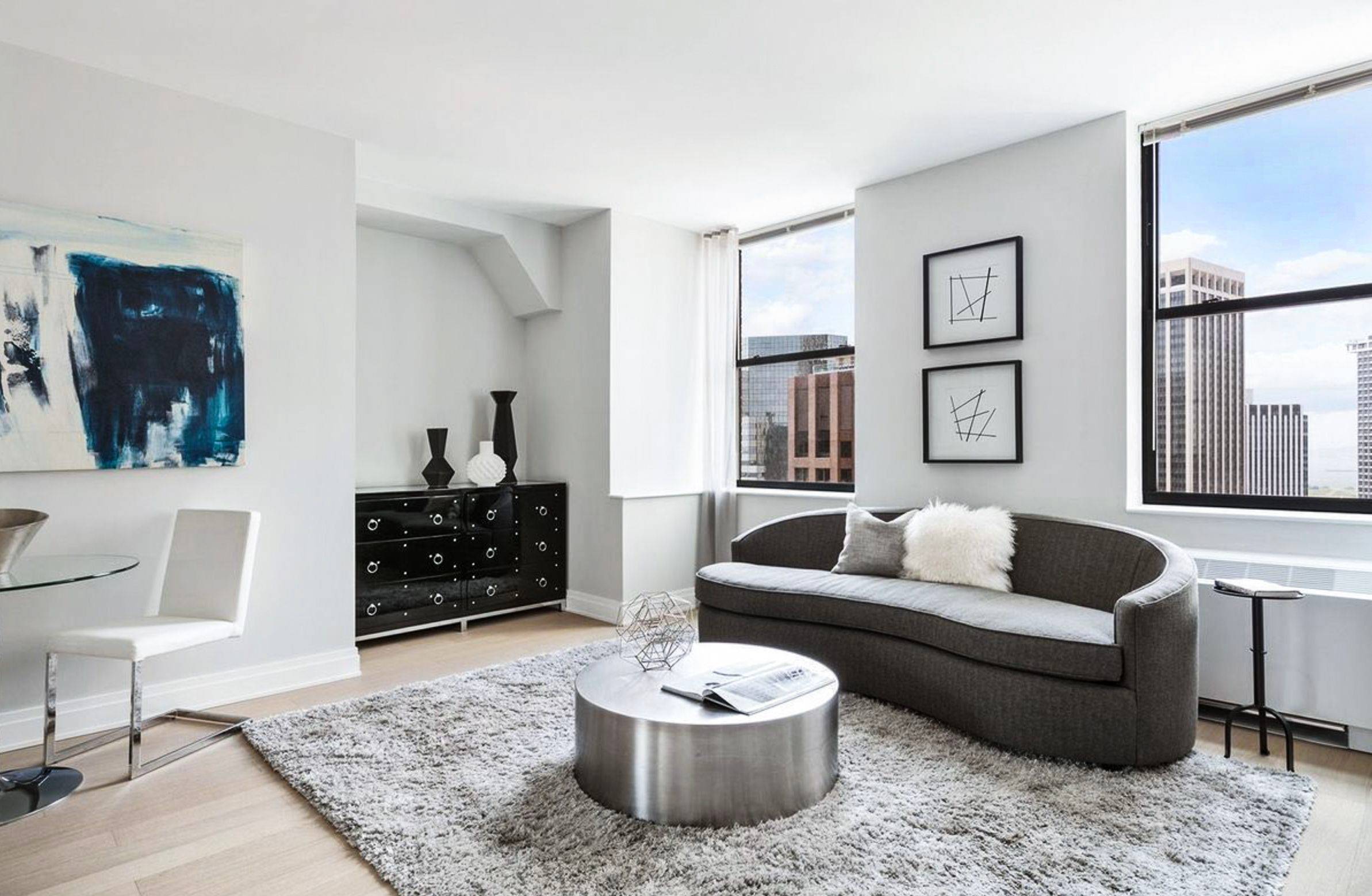 Great one bed apartment features a large flexible layout perfect for an at home office, gourmet kitchen with stainless steel appliances, stone countertops, high ceilings, wood floors throughout, walk in ...
