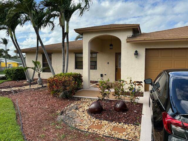 Delray Beach, No HOA, 3 bedrooms 2 baths, converted two car garage for entertainment family rm man cave, can be converted back to garage.