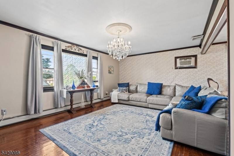 Welcome to this beautifully maintained two family home located in the heart of Elmwood Park.