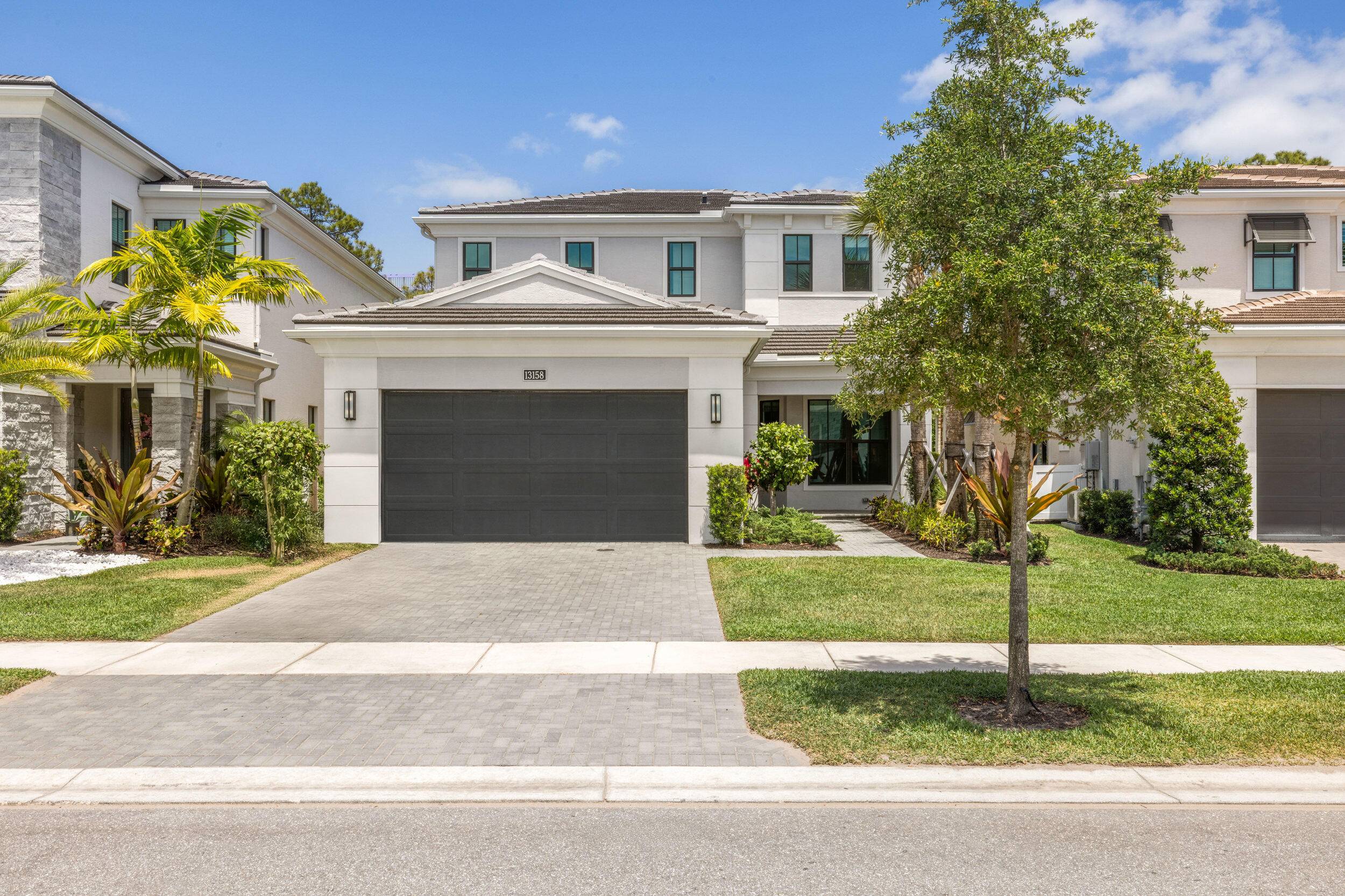 Welcome to your dream home nestled in the vibrant, gated community of Artistry Palm Beach in Palm Beach Gardens, FL.
