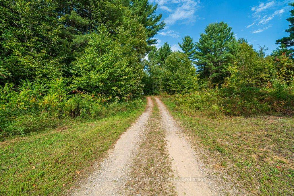 Discover the ultimate retreat on this breathtaking 51 acreproperty in Northbrook, ON, where privacy and nature intertwine to create your personal sanctuary.