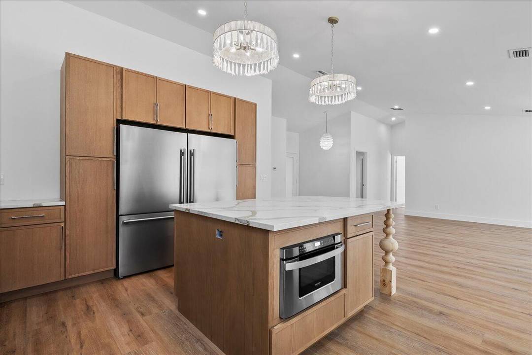 NEWLY REIMAGINED JUPITER FARMS ESTATE Two Fully Renovated Homes on 1.