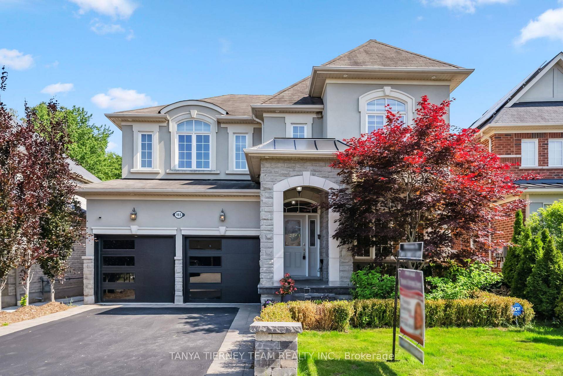 Spectacular treed ravine lot with finished basement in law suite !