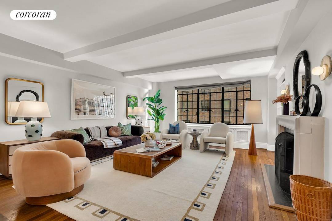 Pied a terres are welcome in this sophisticated residence nestled in a serene cul de sac with delightful peeks of the East River.