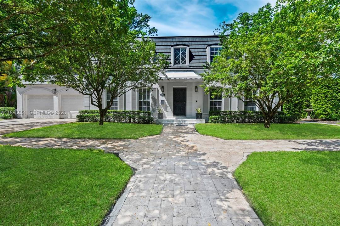 Nestled on an oversized lot along historic Country Club Prado, this French Country style two story home blends classic elegance with modern luxury.