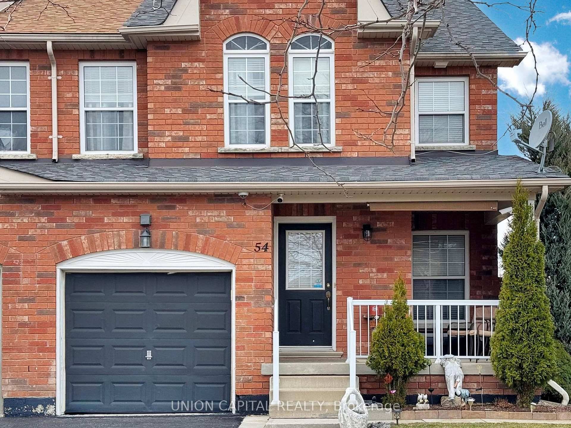 Welcome to this beautifully maintained over 1800 sq ft end unit townhouse offering incredible space, functionality, and versatility.