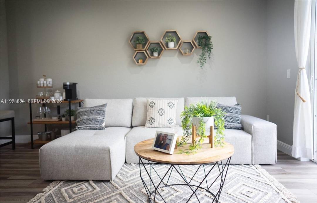 Enjoy the lake view from this renovated two story townhouse offering comfort, style and tranquility.