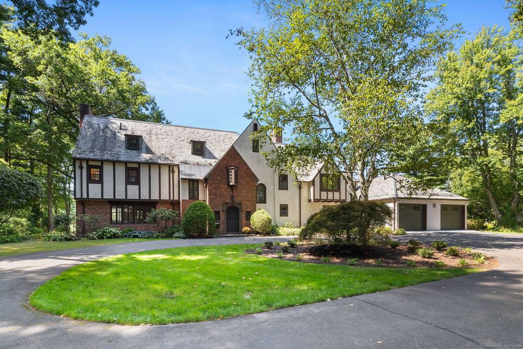 Sophisticated living meets timeless elegance at 111 Bloomfield Avenue, ideally located minutes from Downtown Hartford and West Hartford Center, with spectacular views of the Hartford Golf Club.