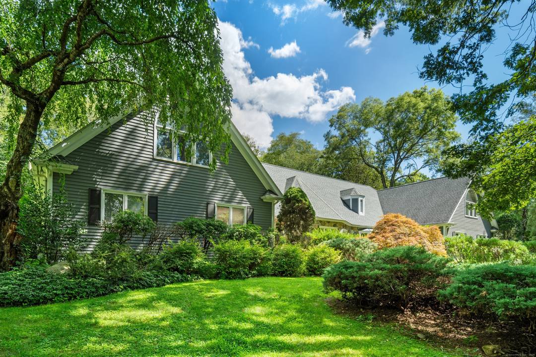 Set on over two private acres in the gated community of The Ridge, this stunning estate combines modern comfort with timeless design.