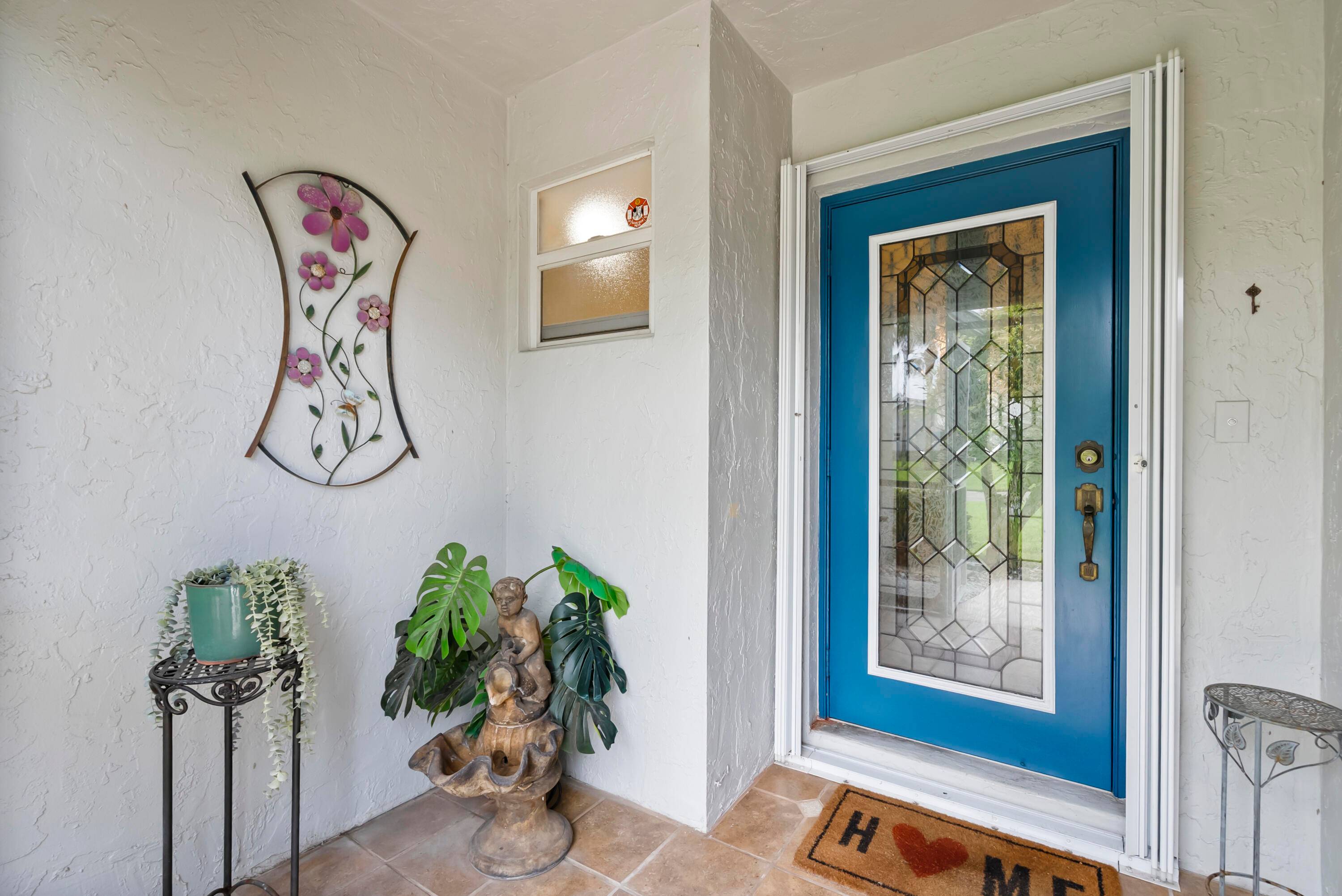 Welcome to 3344 SW Villa Place, nestled on a quiet street in the desirable gated community of Sunset Trace in Palm City.