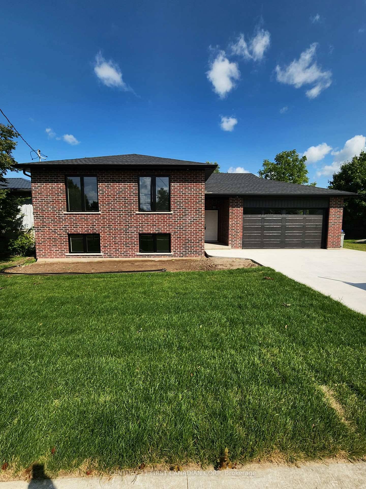 COMPLETED NEWLY BUILT RAISED RANCH IN THEDFORD, WITH DOUBLE CAR GARAGE AND CONCRETE DRIVEWAY.