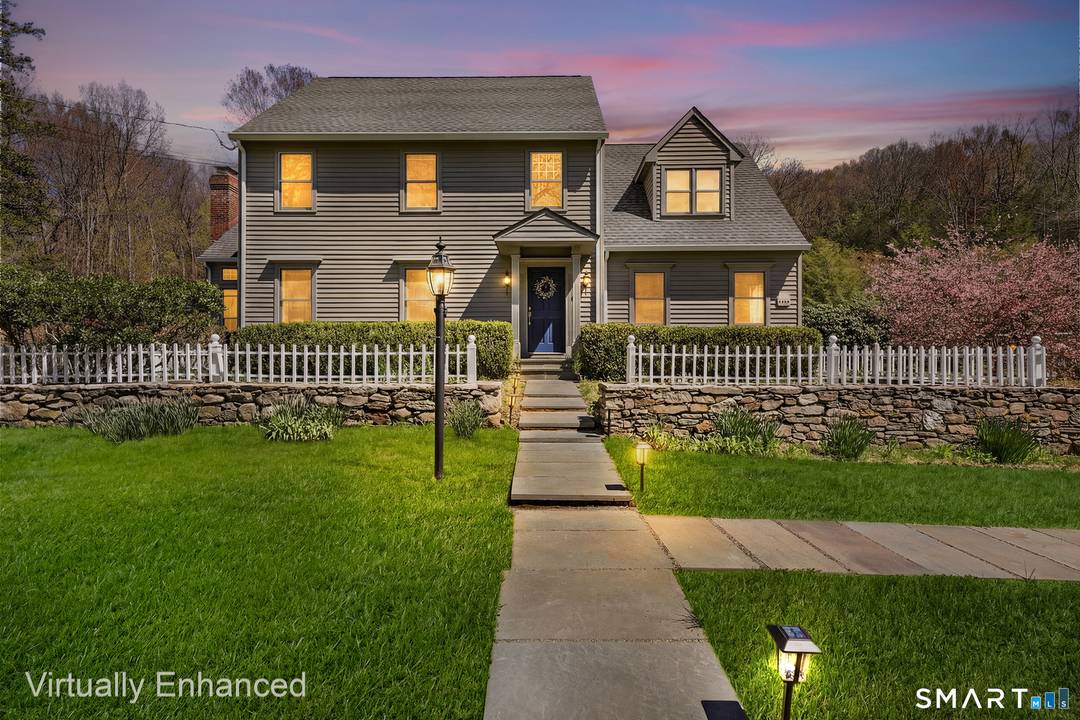 Beautiful 4 bedroom, 2. 5 bath Colonial set on a picturesque, park like property in desirable southern Roxbury.