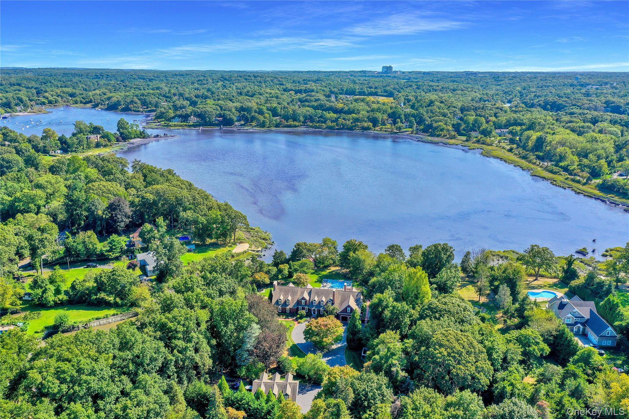 Magnificent Country Waterfront Estate on shy 3 acres tucked away in Strong's Neck, Setauket.
