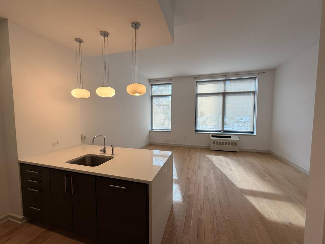 Welcome to Residence 1D at 21 45 44th Drive a charming loft style home nestled in the heart of vibrant Long Island City.