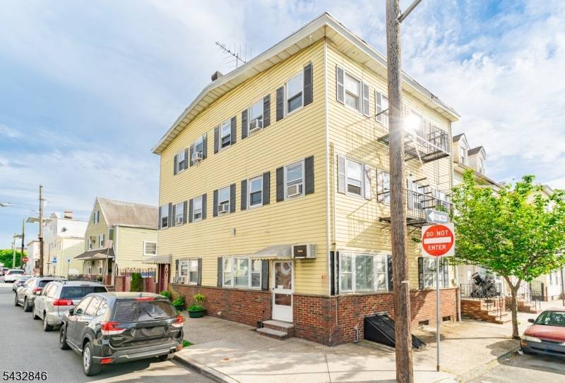 Calling all Investors, First time home owners, Owner Occupied to come view this corner property in the heart of the Ironbound.