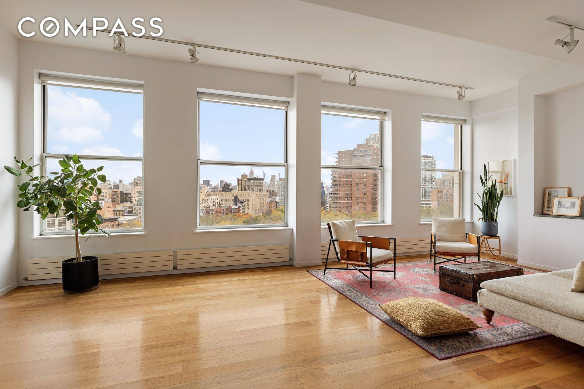 Highly coveted, rarely available, renovated, front facing, 2B 2B with 11 foot ceilings and sweeping views of Seward Park !