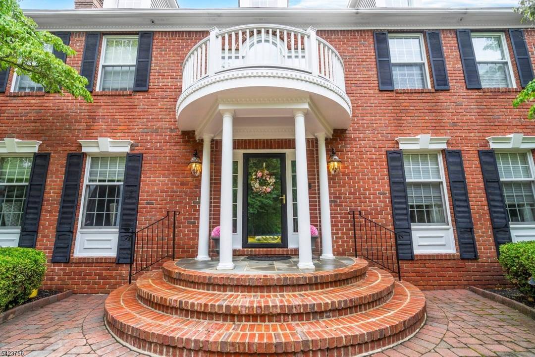 Nestled in the prestigious Ravenswood Estate neighborhood of Far Hills, Bernards Township, this breathtaking five bedroom Georgian Colonial is a masterpiece of timeless elegance and modern luxury.