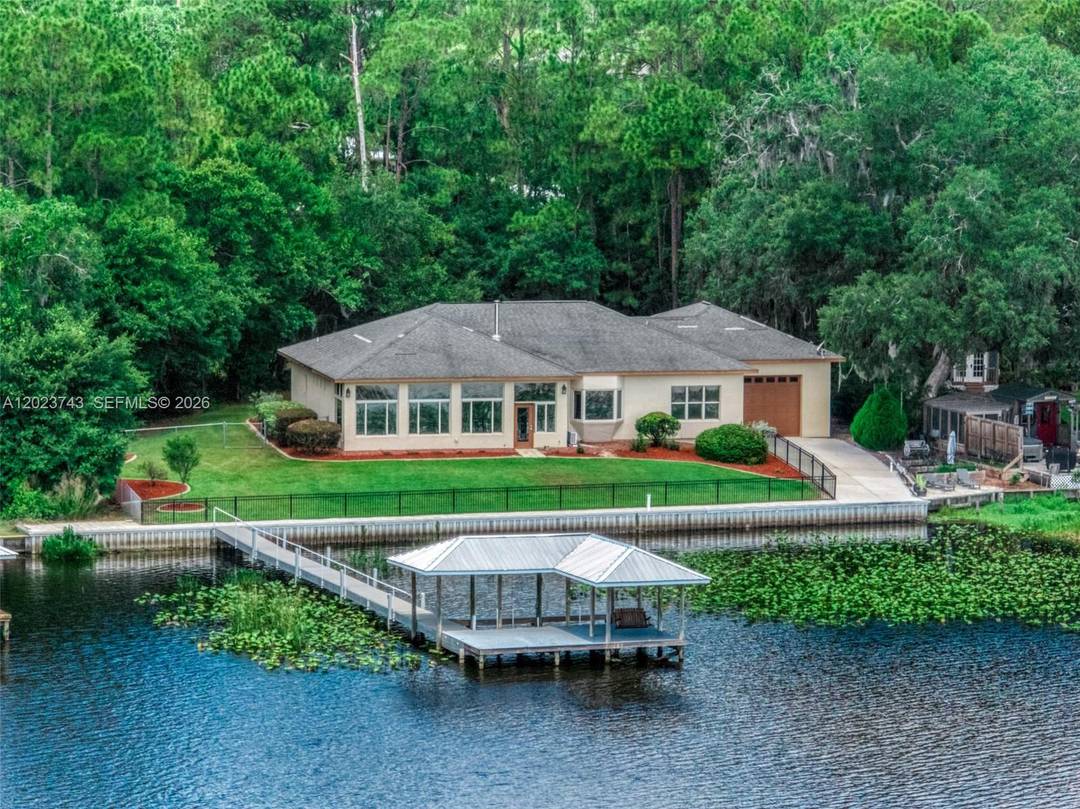 Experience luxury lakefront living in Sebring with this custom built home on beautiful Lake Josephine.