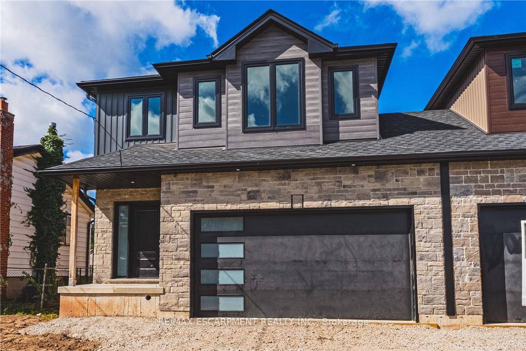 Stunning four bedroom home with separate side door entrance leading to basement ideal for additional dwelling space.