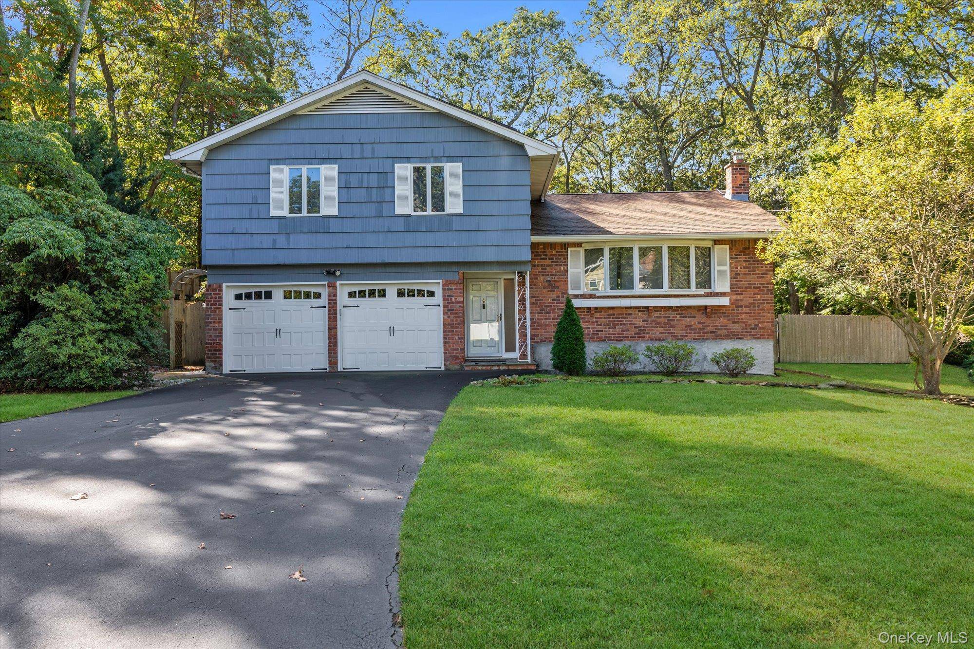 Welcome to 8 Monett Place Located on a picturesque, tree lined street within the desirable Harborfields School District and minutes to Huntington Village and Vanderbilt museum and Planetarium.