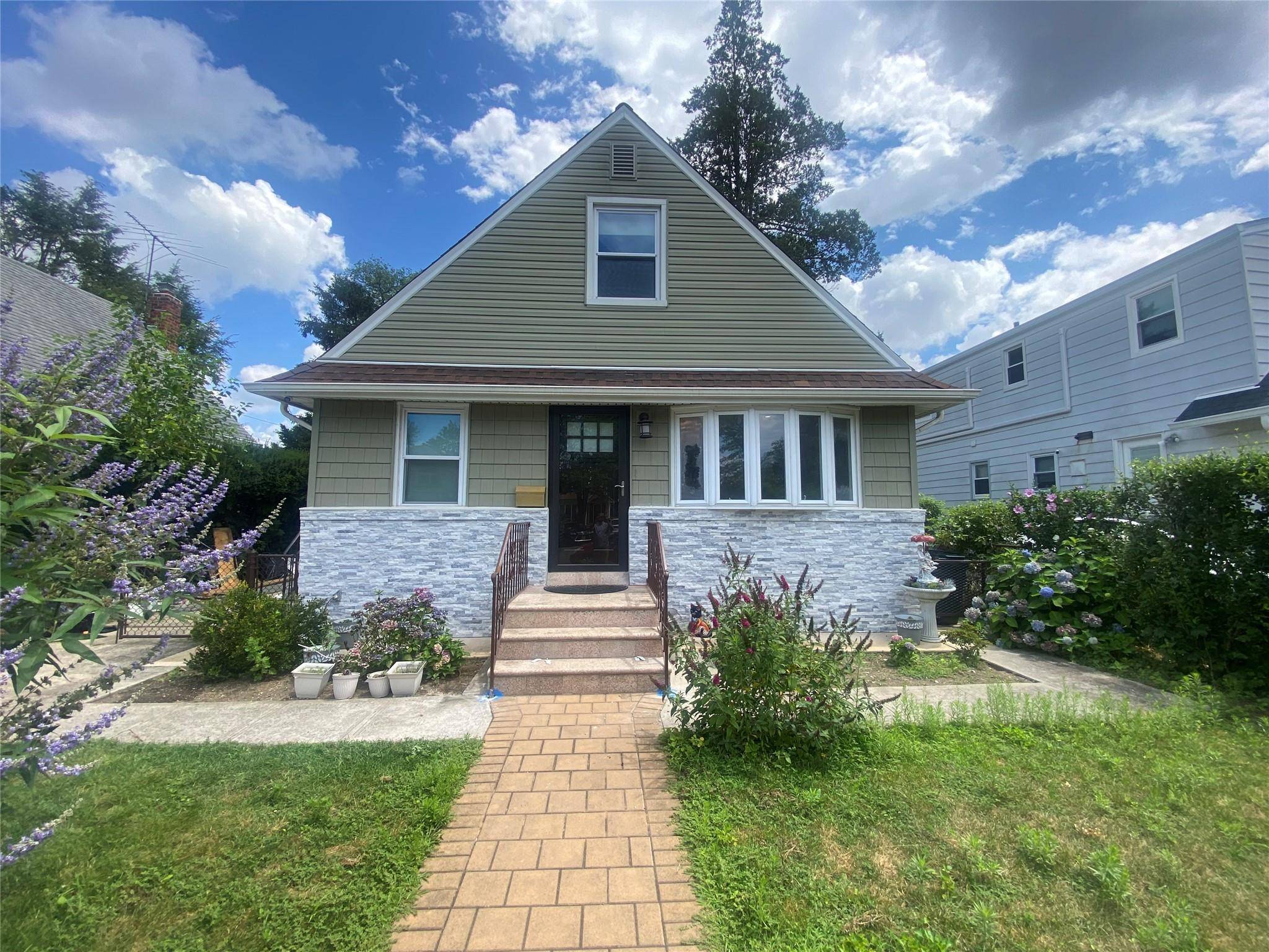 A MUST SEE ! ! ! ! ! Completely Renovated Home Located in the Heart of New Hyde Park, in the Herricks School District.