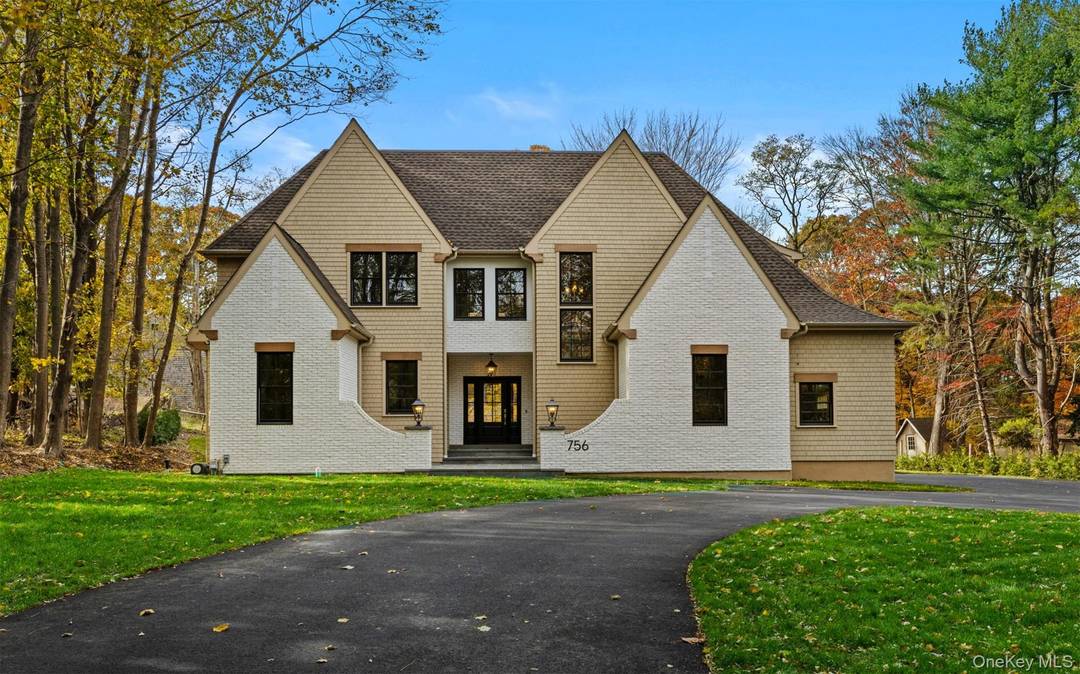 Discover the epitome of architectural brilliance with this newly completed cedar and brick sided Modern Colonial which offers over 3, 500 sq.