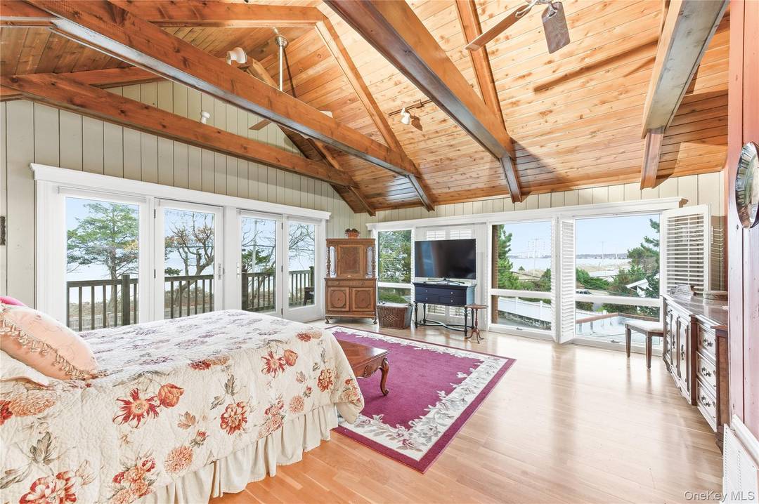 Discover your private beach retreat in this exceptional waterfront home perfectly positioned with shore to shore access between the Long Island Sound and Duck Island Bay.