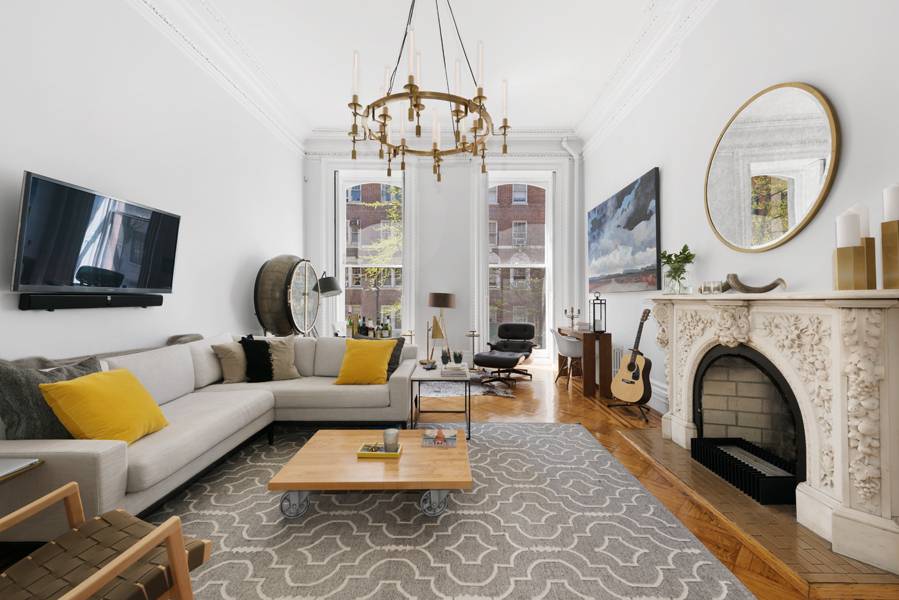 27 West 9th Street is a magnificent, landmarked townhouse, located on a picturesque block in the heart of Greenwich Village.