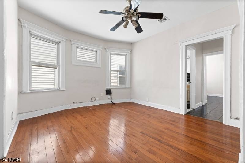 Spacious and versatile three family property offering exceptional income potential and flexibility.