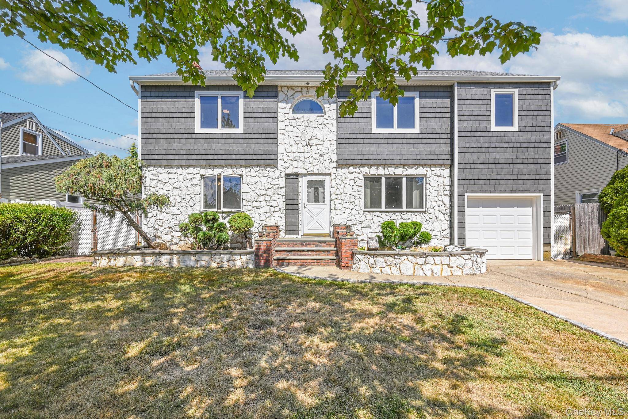 Welcome to 203 N Manhattan Ave an outstanding colonial home located in the heart of Massapequa.