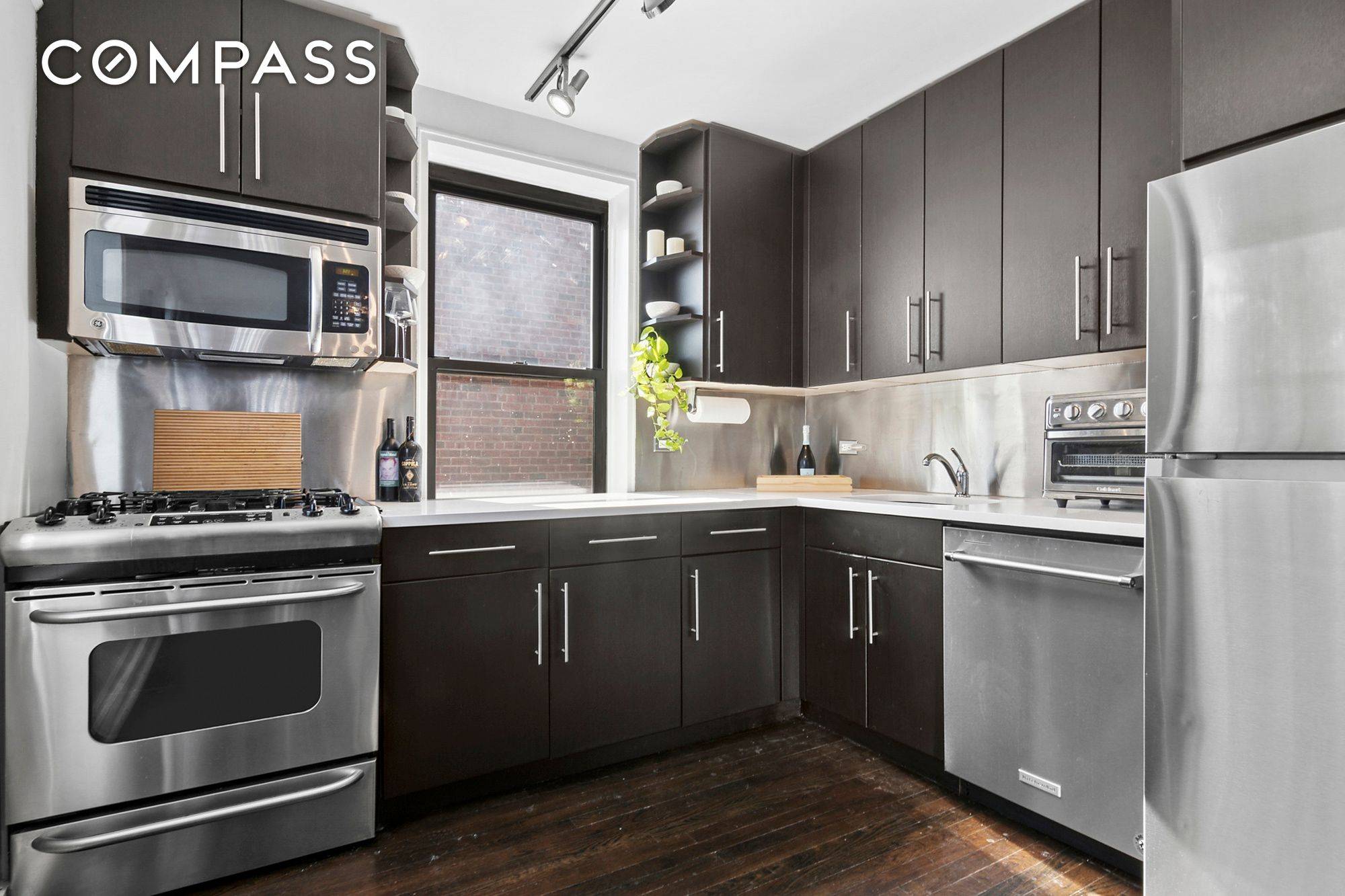 Experience modern living at its finest in this beautifully renovated 2 bedroom, 2 bathroom condo with parking included in a sought after doorman building.