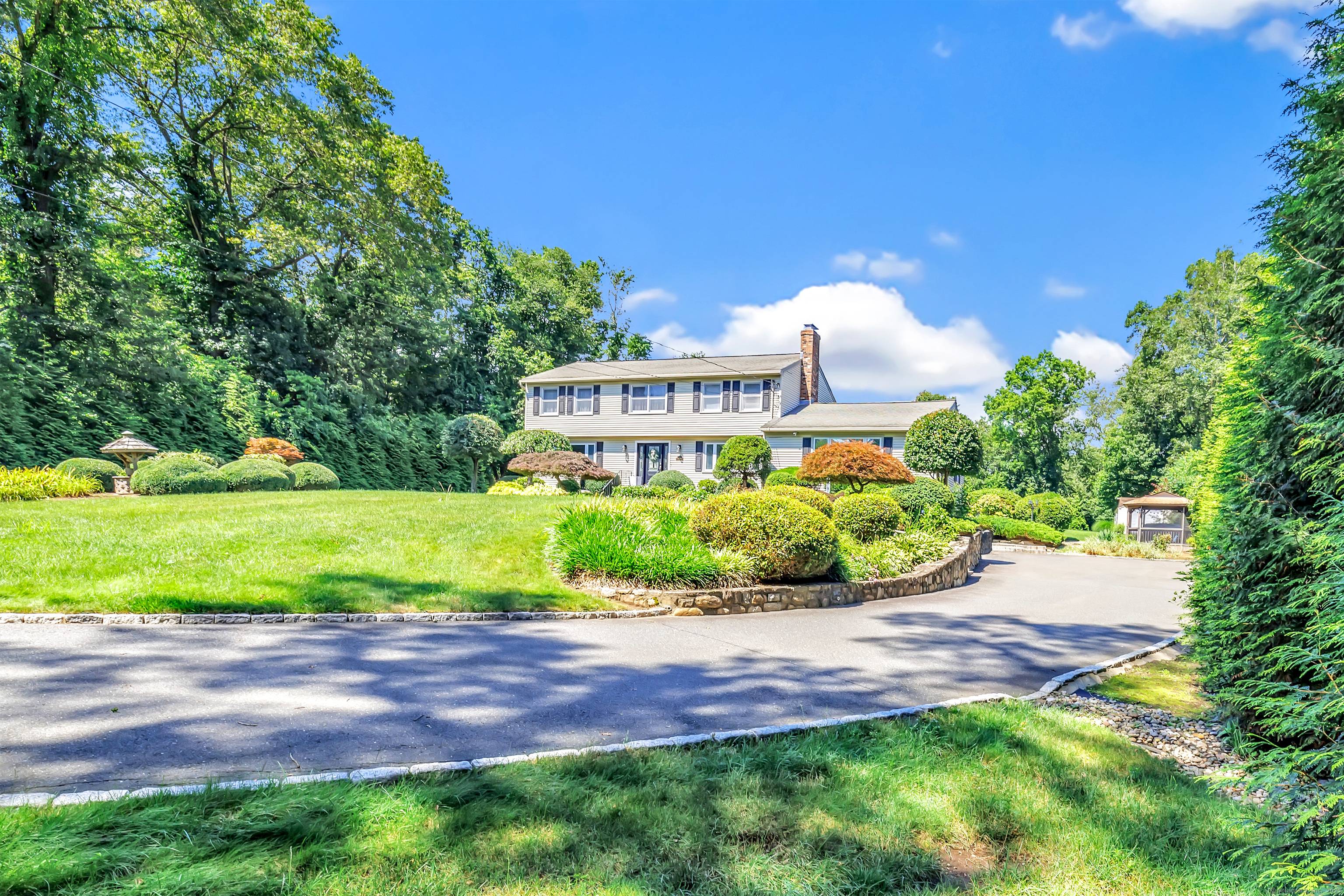 This Gorgeous Colonial awaits you at the end of a quiet cul de sac !