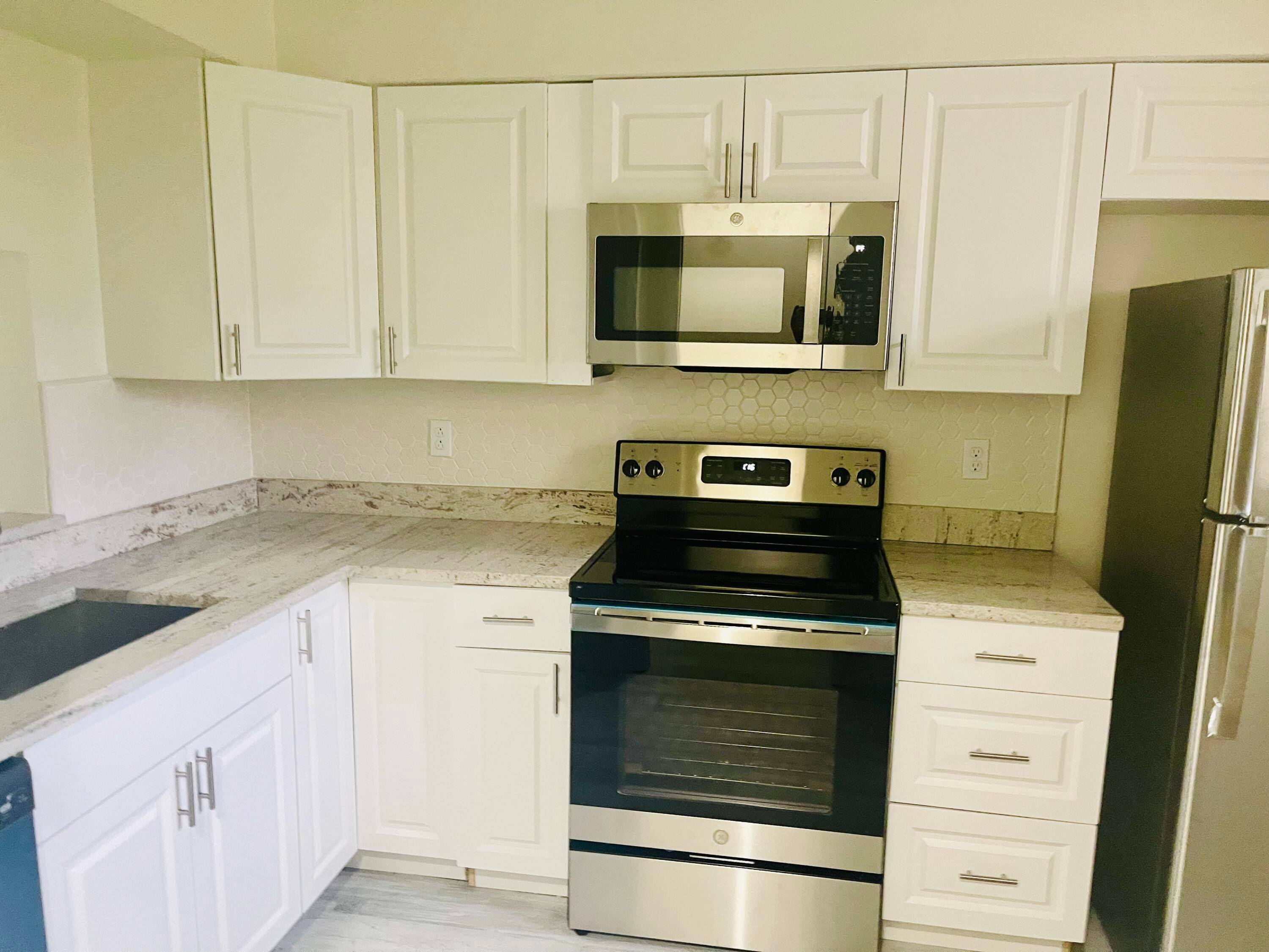 Newly renovated 2 bed 1. 5 bath condo with a pool in a gated community.