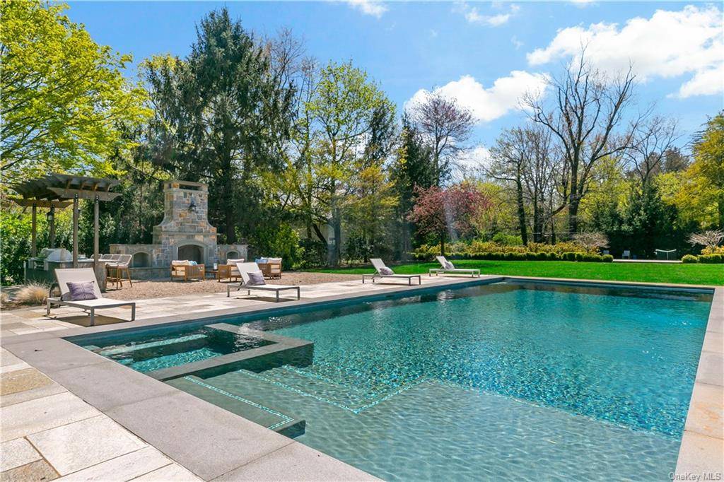 Located just 30 minutes from NYC, this modern farmhouse style retreat, situated on 2.