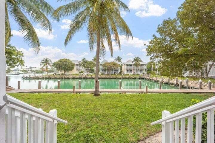 Experience breathtaking views of Lake Lucille from this meticulously updated three bedroom, three bathroom townhouse at Hawks Cay Resort.