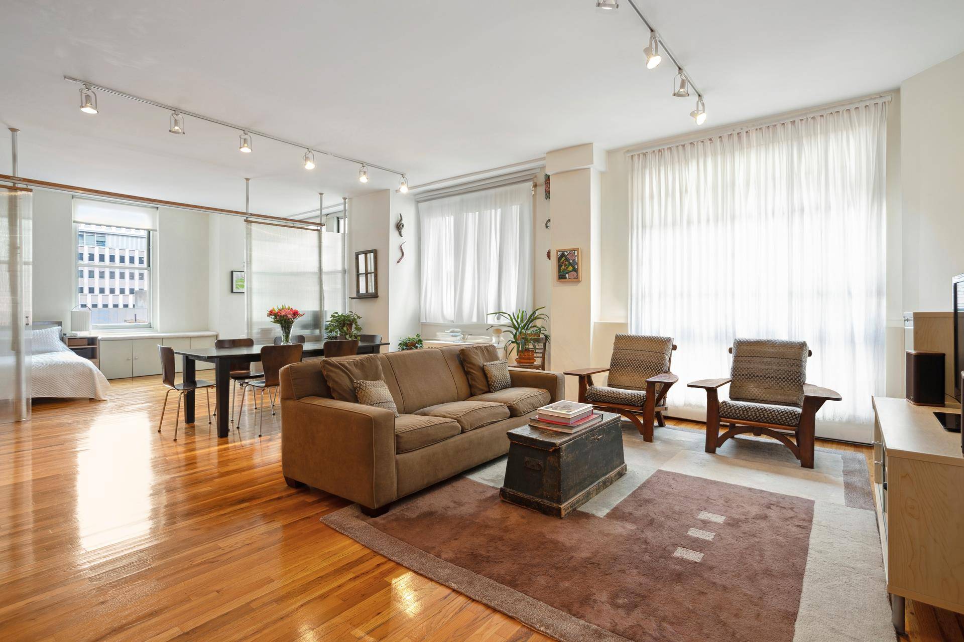 Downtown Loft Living. A serene 1400 square foot loft in the heart of the financial district to call home.