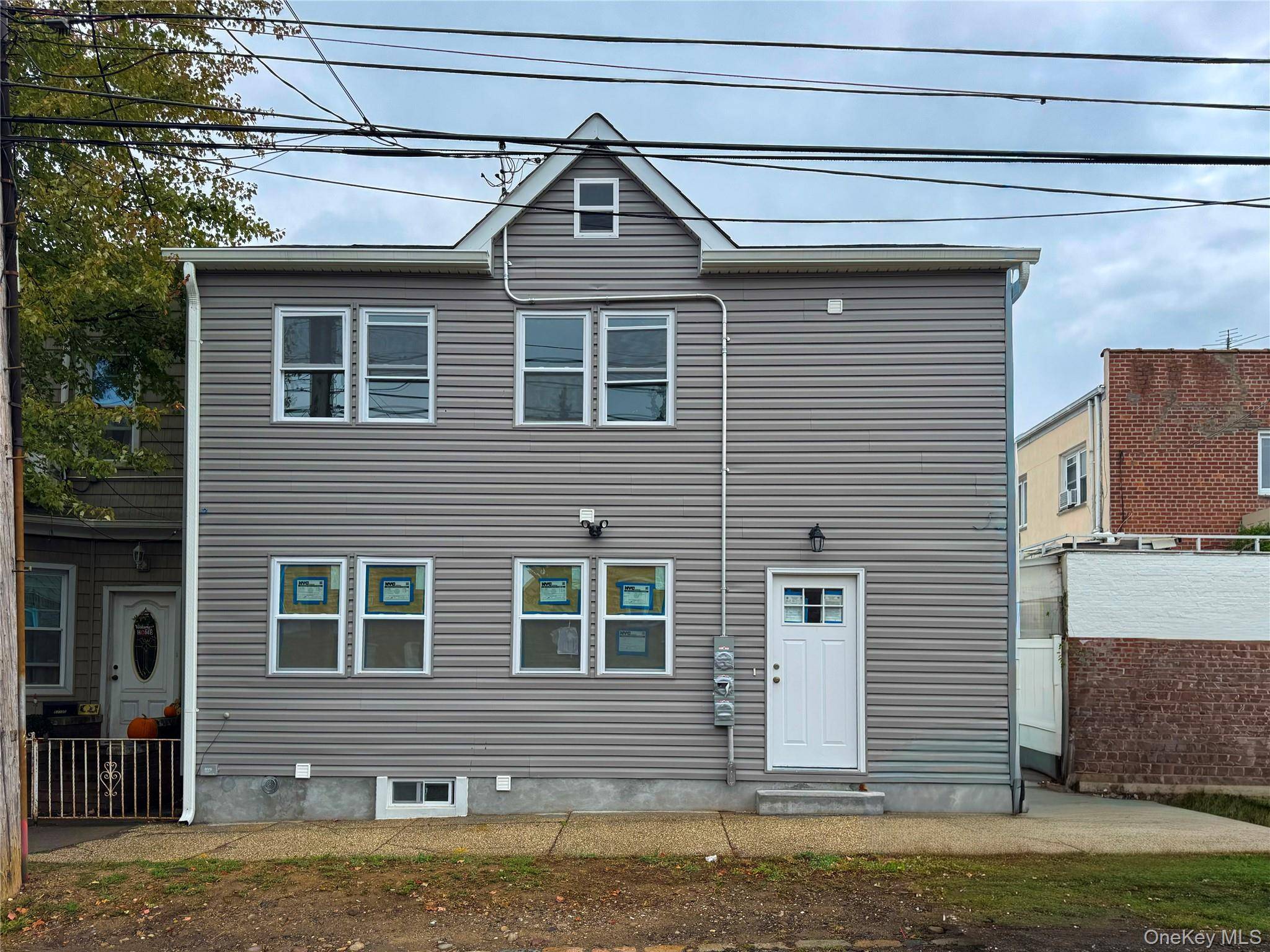 Discover this newly renovated 2 family house offering modern comfort and unbeatable convenience.
