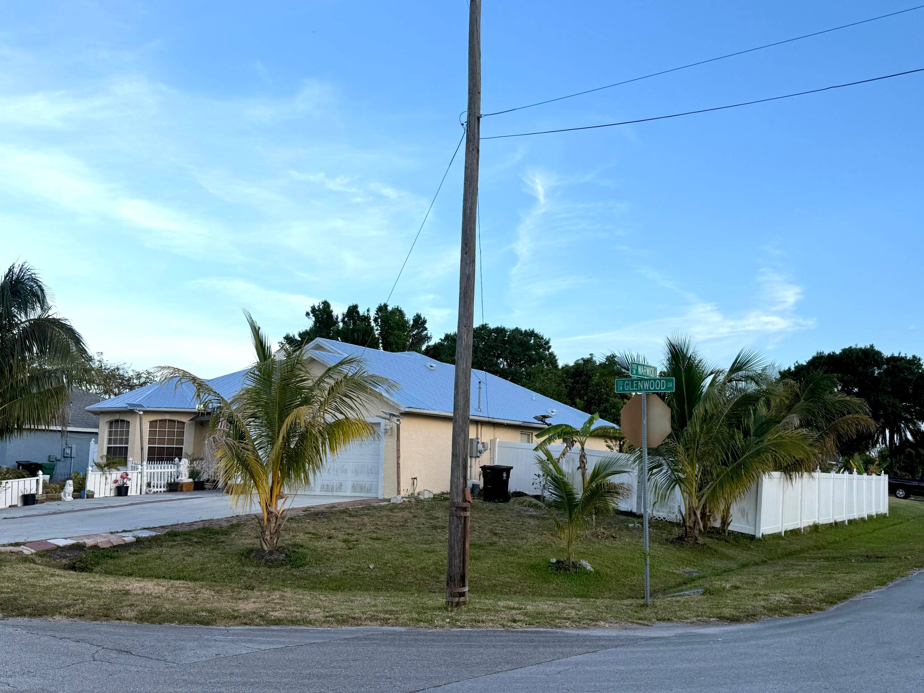 3 2 2 2022 METAL ROOF, FRONT PORCH, VINYL FENCE, ON A LARGE HIGH AND DRY CORNER LOT WITH SEVERAL FRUIT TREES, REAR SCREENED PATIO, GRANITE COUNTERTOPS.