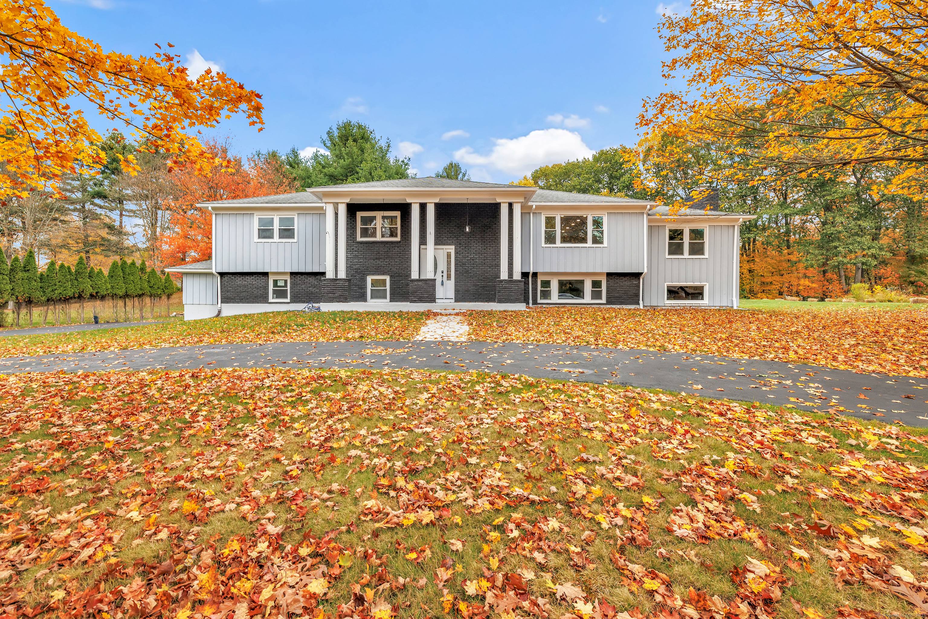 Welcome home to this stunning, completely renovated expanded raised ranch !