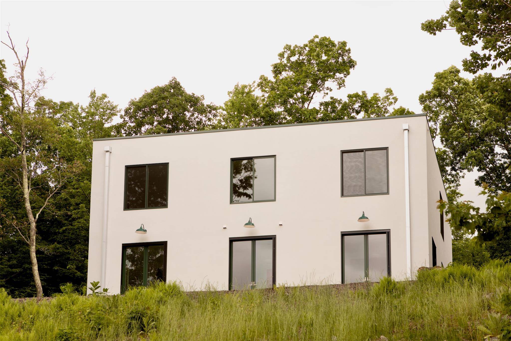 The Nine Square house is, at its core, an authentic country house.
